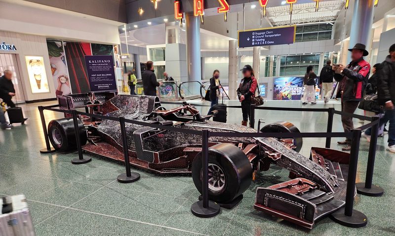 A bejeweled F1 race car at the Las Vegas airport.