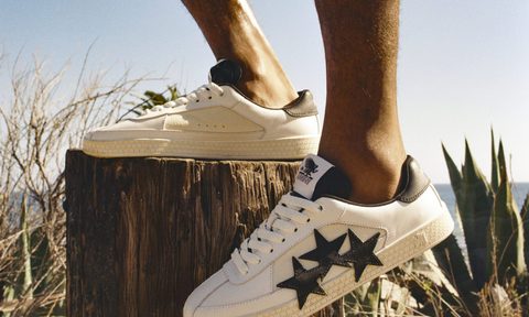 close up on white sneaker with stars