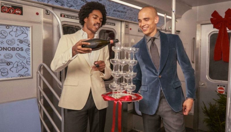 Bonobos Holiday collection pouring champagne