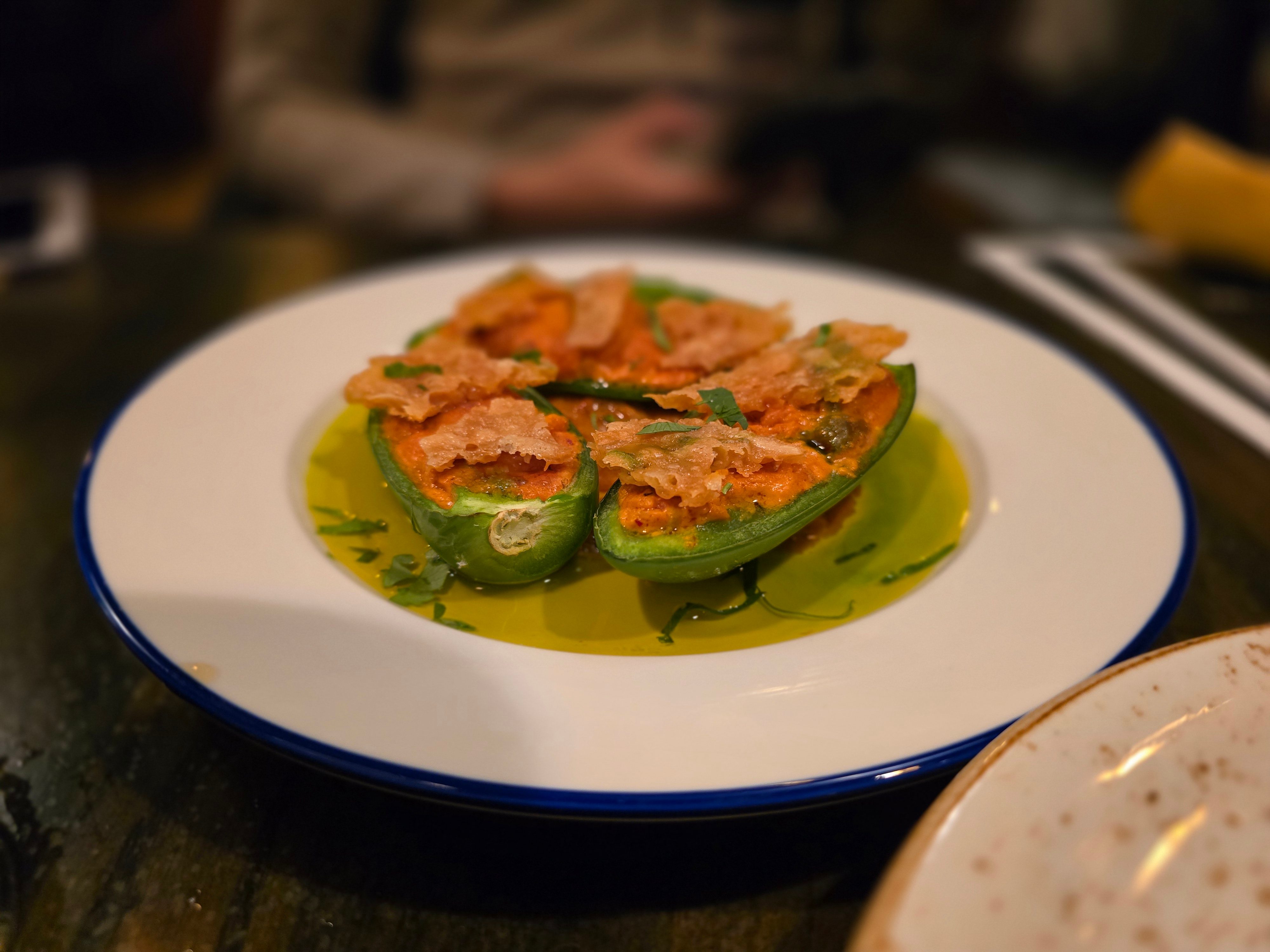 a plate of three poppers