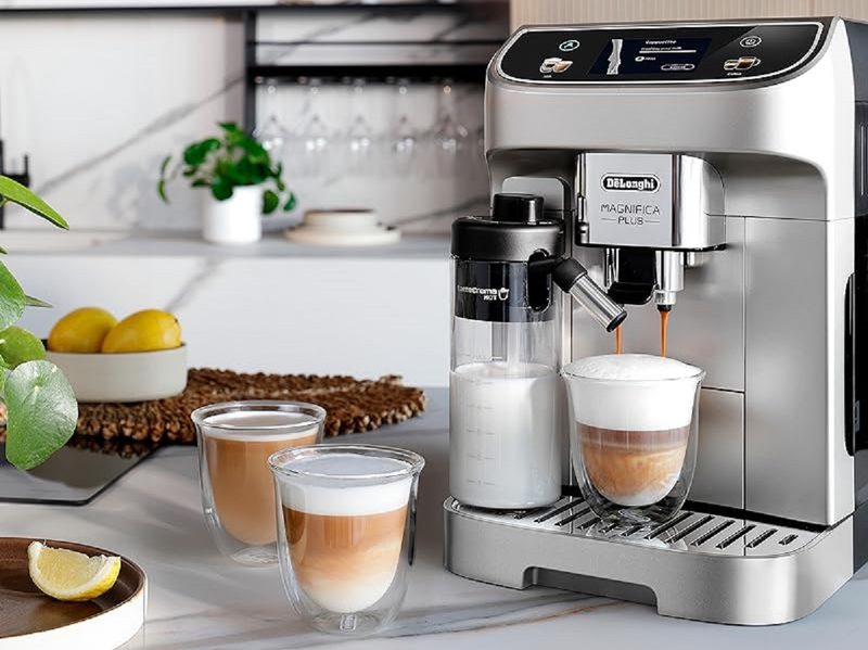 The De'Longhi Magnifica Plus Fully Automatic Espresso Machine on the kitchen countertop.
