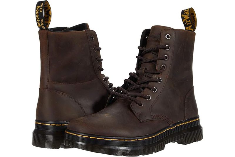 The Dr. Martens Unisex Combs Leather Casual Boots on a white background.