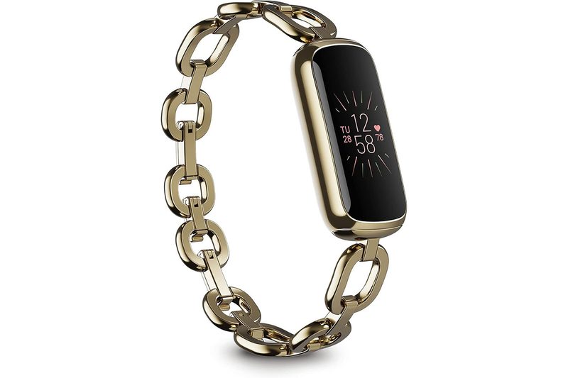The Fitbit Luxe on a white abckground.