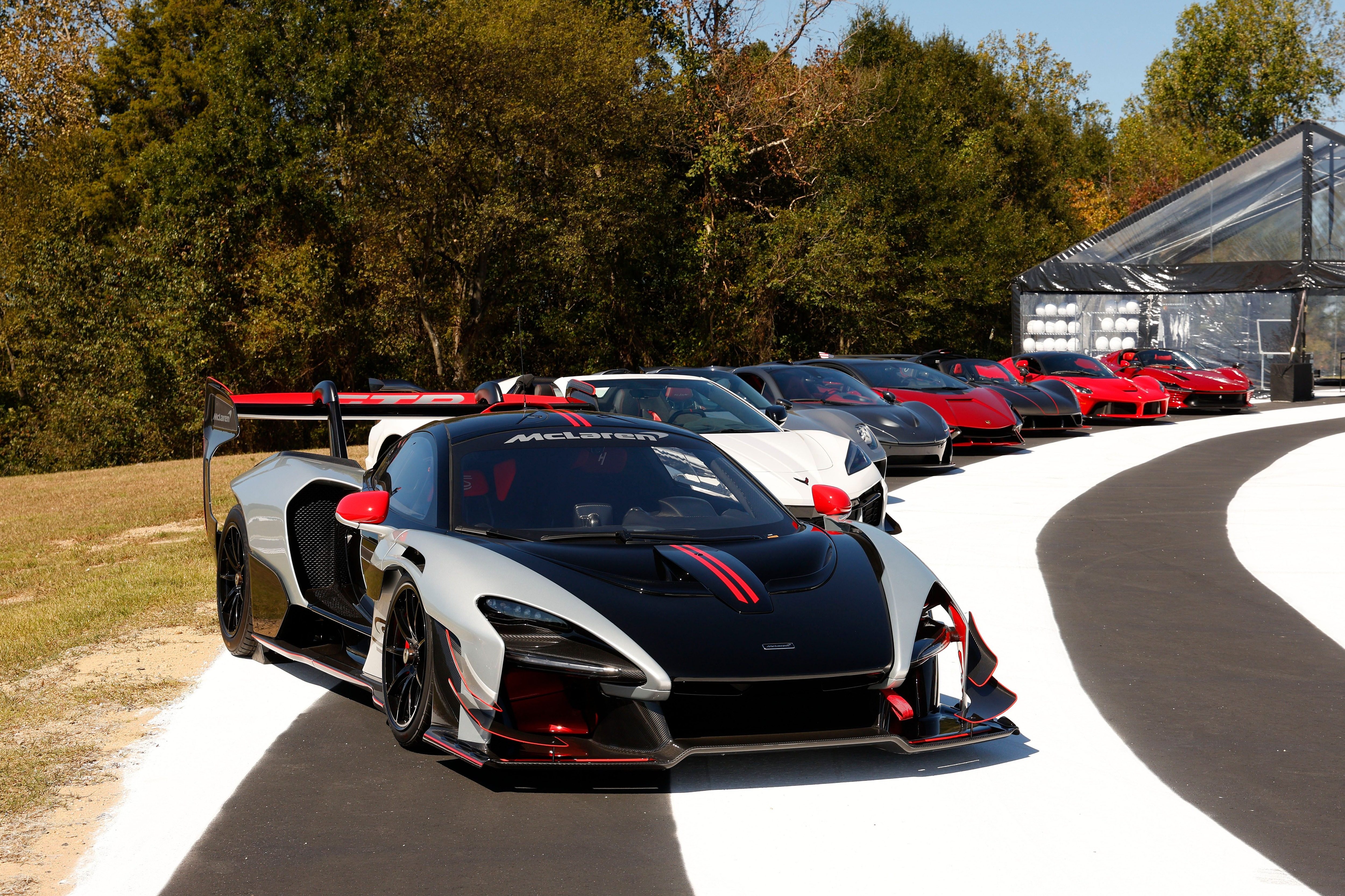 McLaren Senna GTR parked in front of a lineup of vehicles at Ten Tenths Motor Club