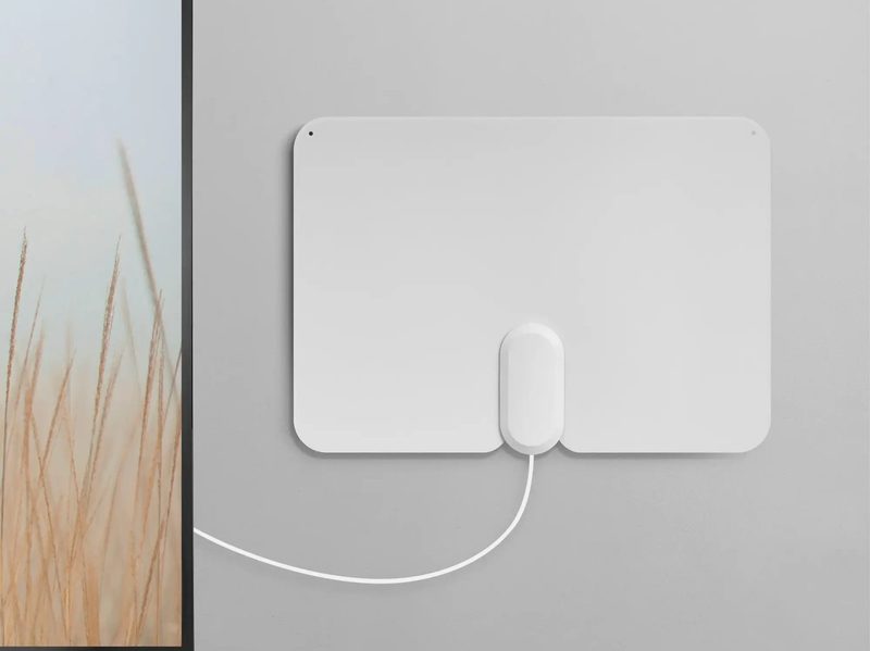 Insignia's Amplified Ultra-Thin Indoor HDTV Antenna, wall-mounted.