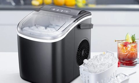 The KissAir Countertop Ice Maker making ice in the kitchen.