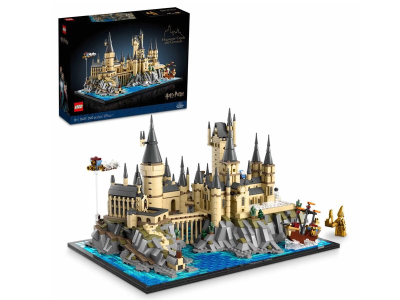 The completed Lego Harry Potter Hogwarts Castle and Grounds set next to its box.