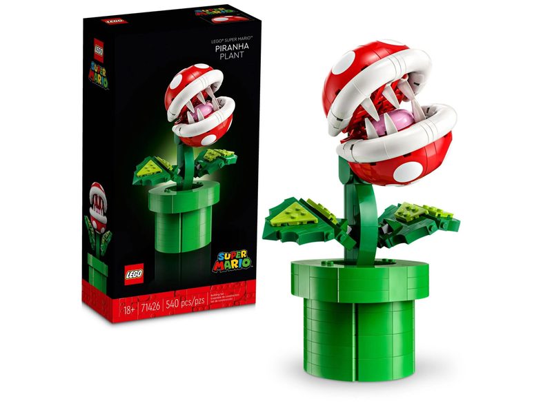 The piranha pipe plant from Super Mario Bros games in a delightful Lego format, next to its box.