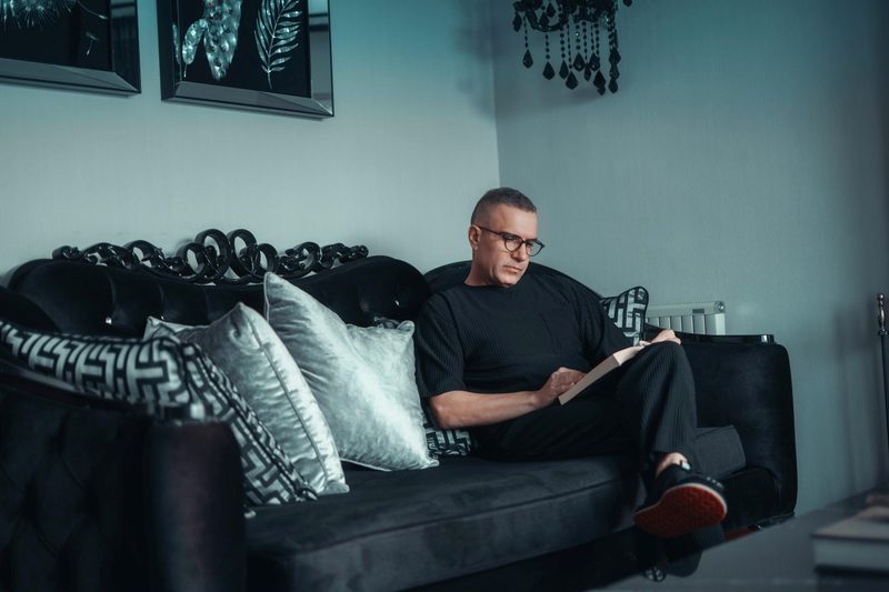Man sitting on couch