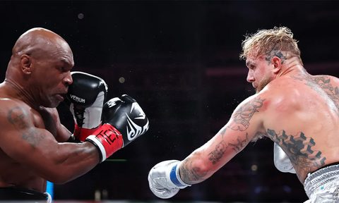 Jake Paul and Mike Tyson fighting.