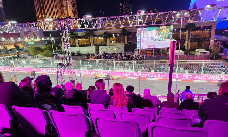 One of the McLaren F1 race cars in FP3 seen from grandstand seating in the T-Mobile Zone at Sphere.