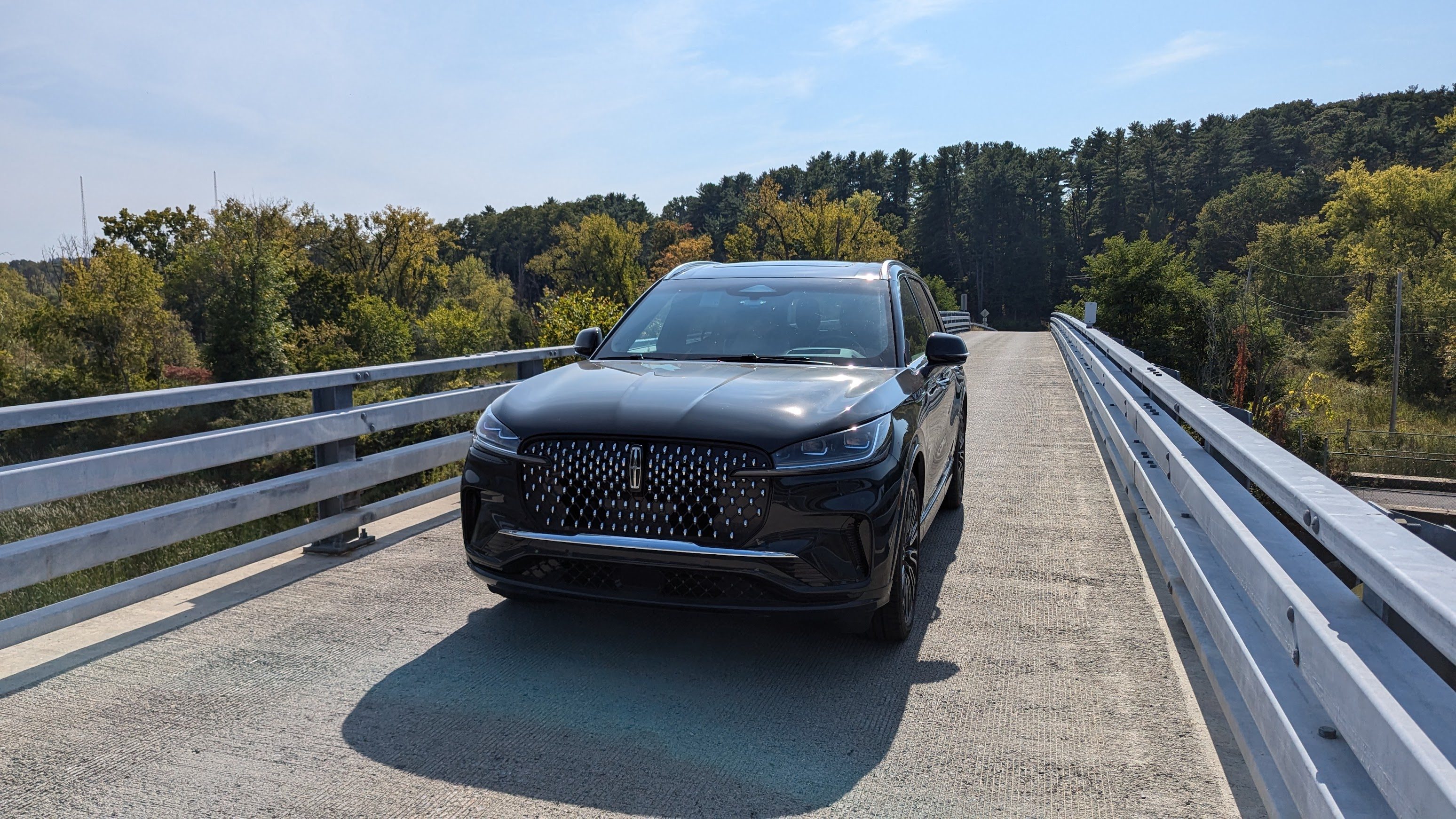 Front view of a 2025 Lincoln Aviator on a bridge
