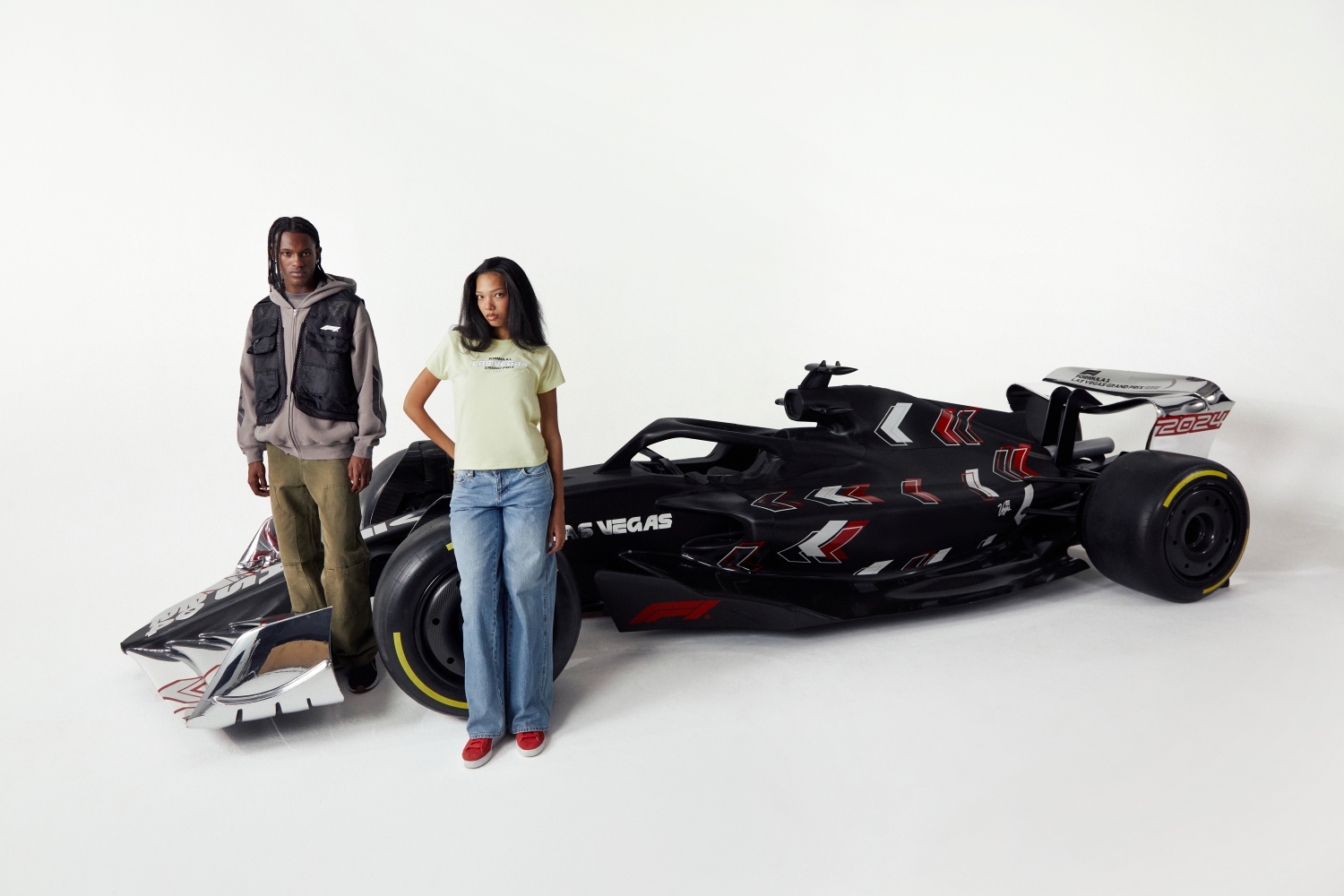 PacSun-Formula-1next-to-a-car.