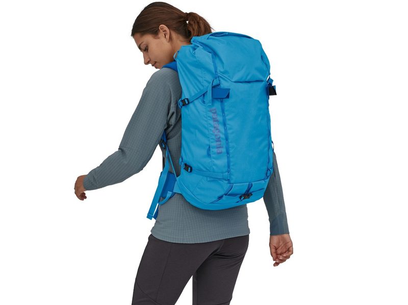 A model wearing the Patagonia Ascensionist Pack 35 L.