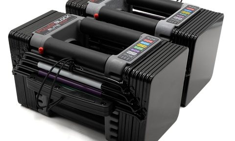 The PowerBlock Elite EXP adjustable dumbbells on a white background.