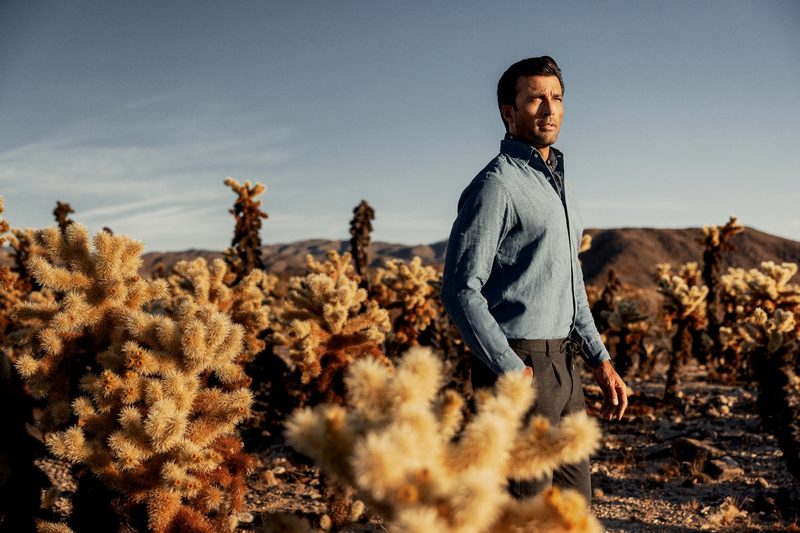 Robert Talbott bomber jacket with shirt and tie in the desert