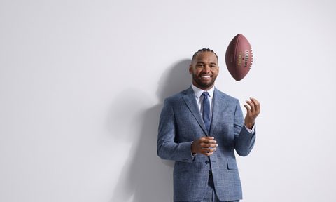 Tua Tagovailoa in a Perry Ellis Suit