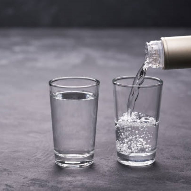 Vodka pouring in a glass