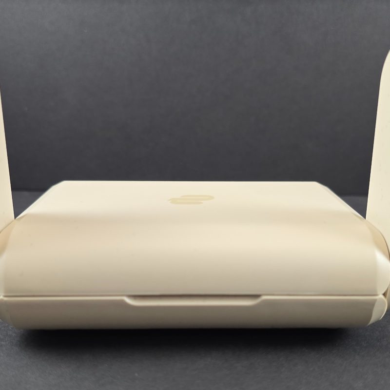 Close up of a cream colored router