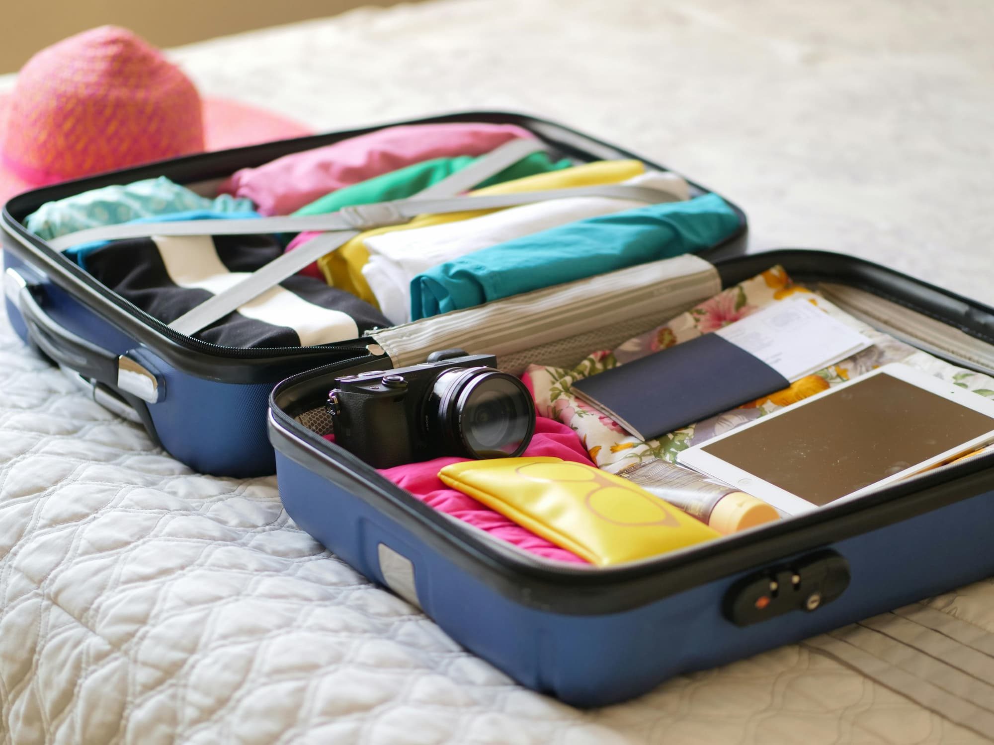clothes packed in an open suitcase