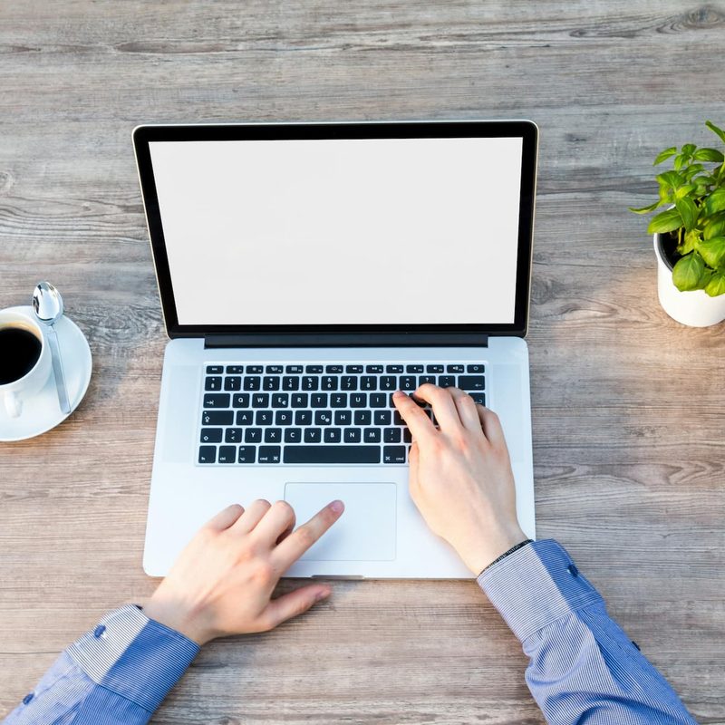Man typing on a computer