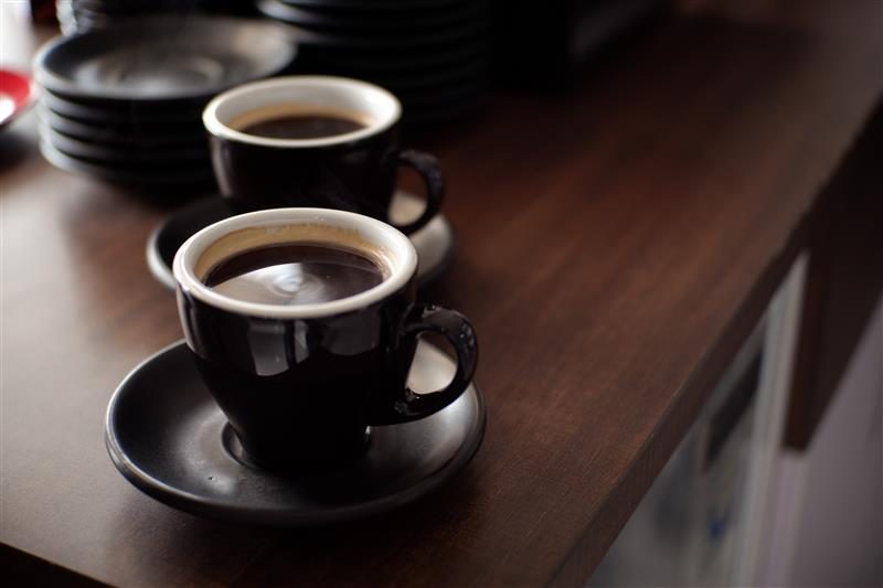 Cup of long black coffee