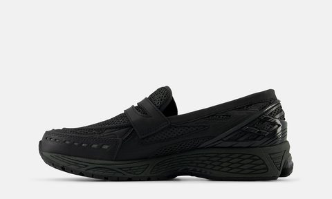 side view of black loafer sneaker