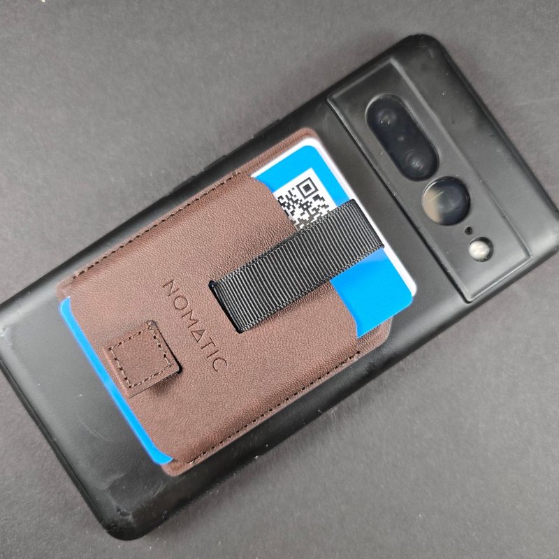 Close up of the magnetic Nomatic Wallet on a phone