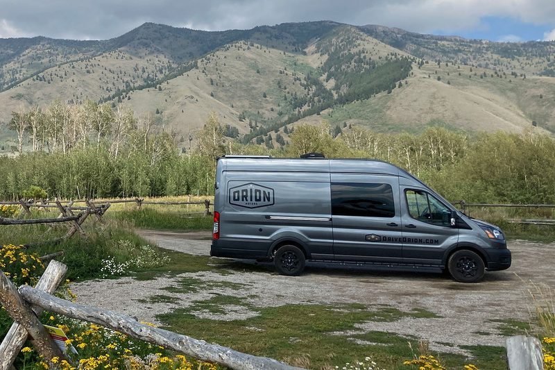 Orion Motors' Orion 365 camper van parked in a mountain setting.