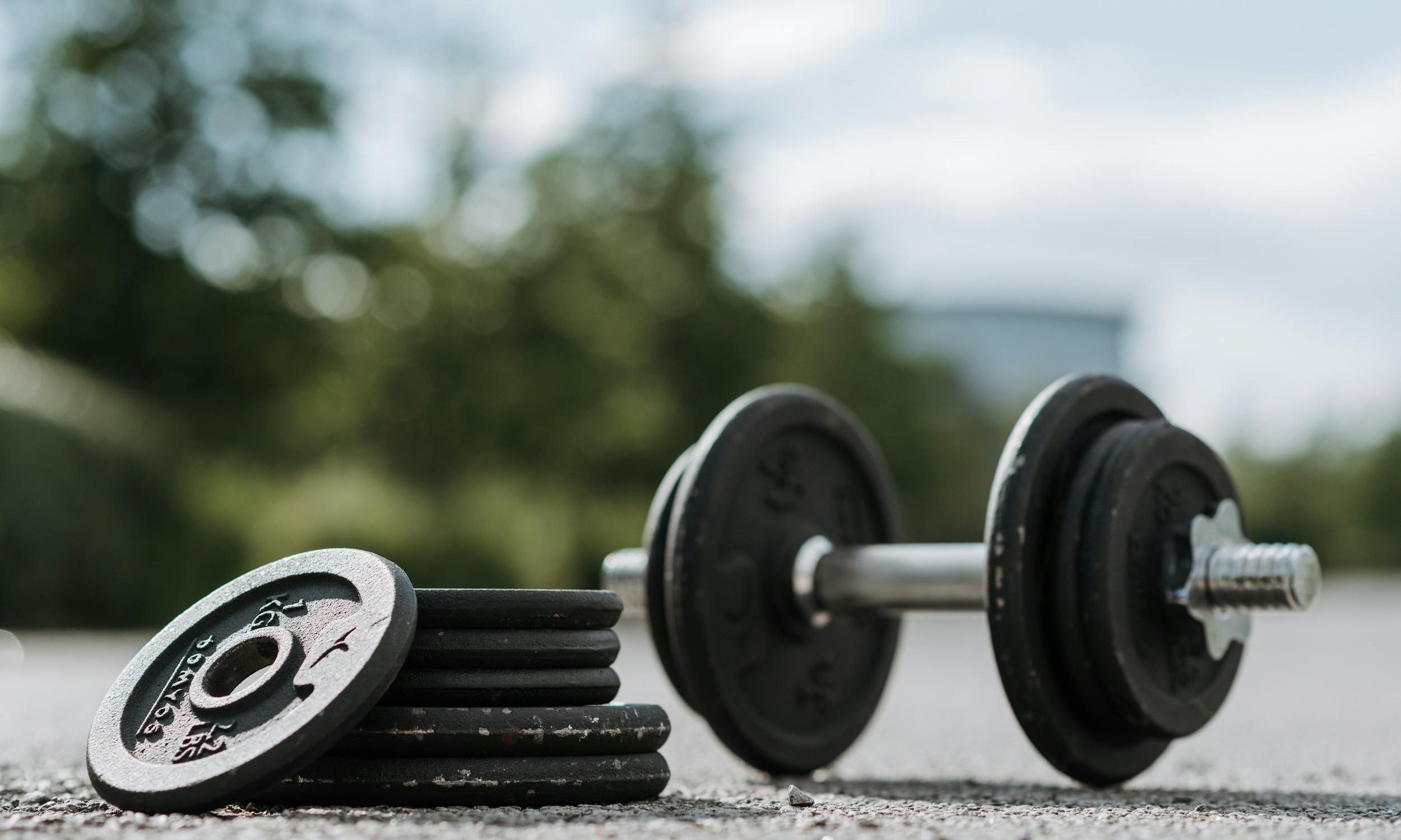 Dumbbell outside on floor weights stack rack