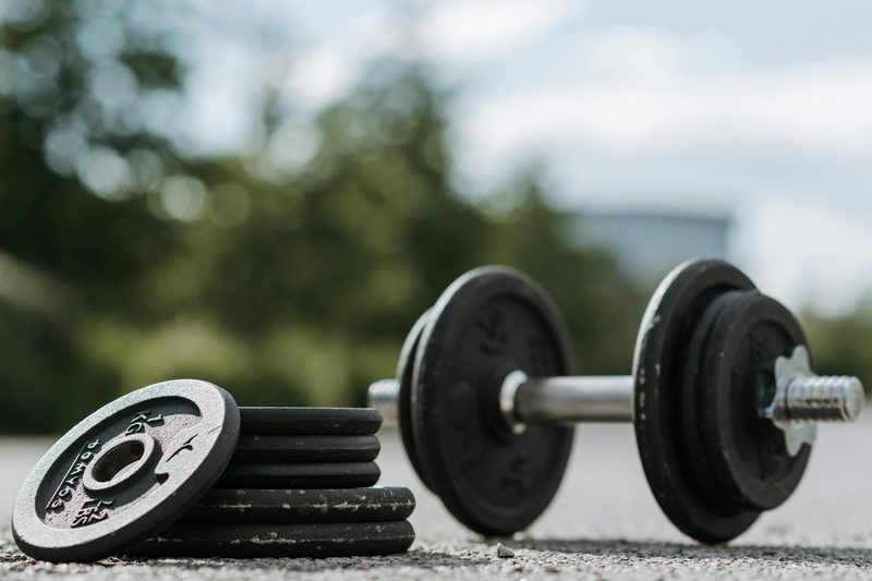 dumbbell outside on floor weights stack rack