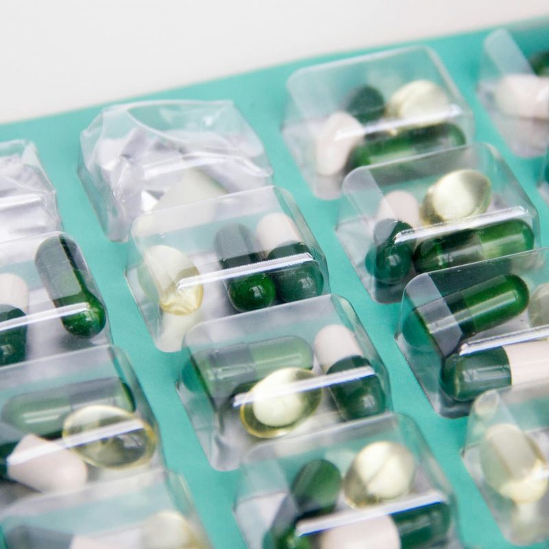 Pills in plastic container