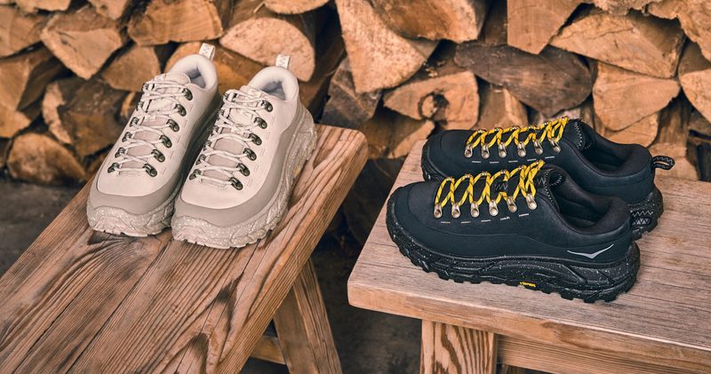 hoka shoes on bench next to logs