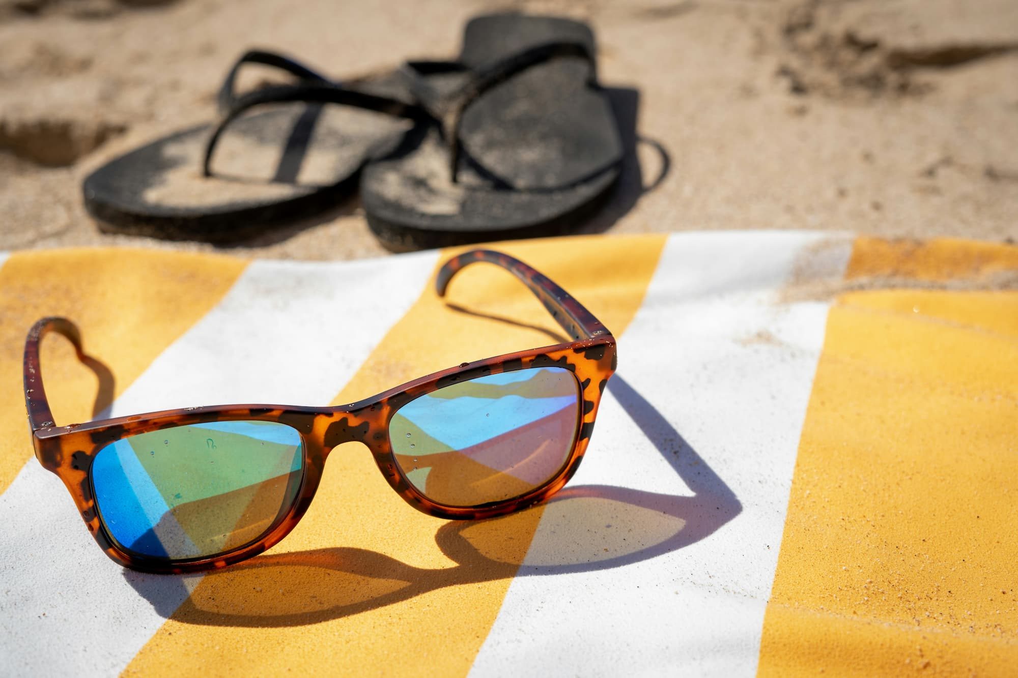 sunglasses on a towel