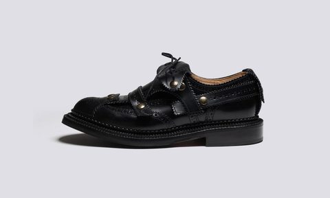 side view of black oxford brogues