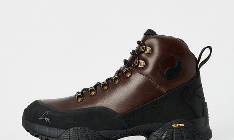 side profile of brown and black hiking boot