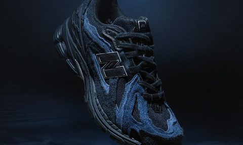 blue and black sneaker in the middle of ocean
