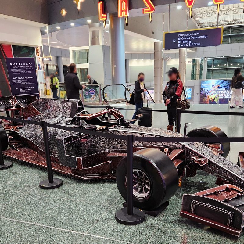 A bejeweled F1 race car at the Las Vegas airport.
