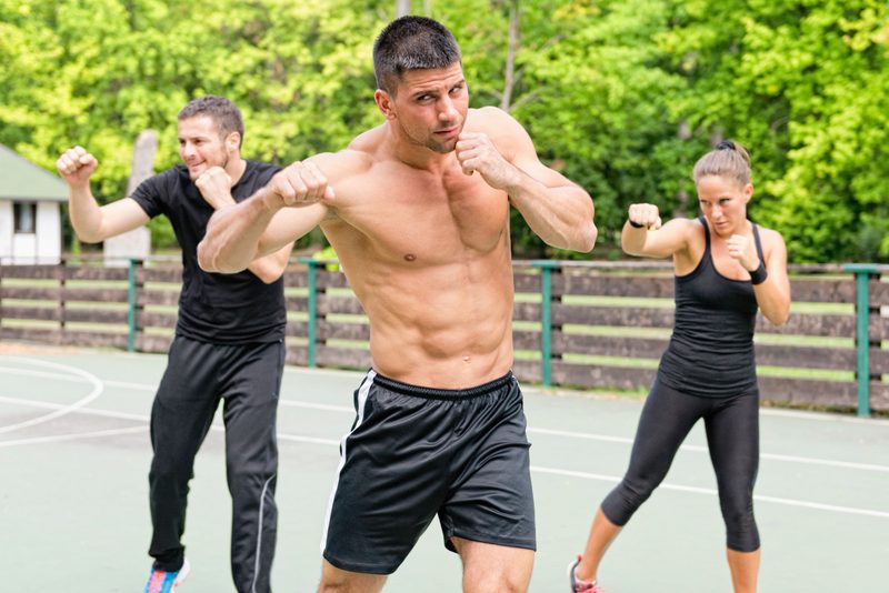 Tae Bo Fitness people kickboxing fitness class group