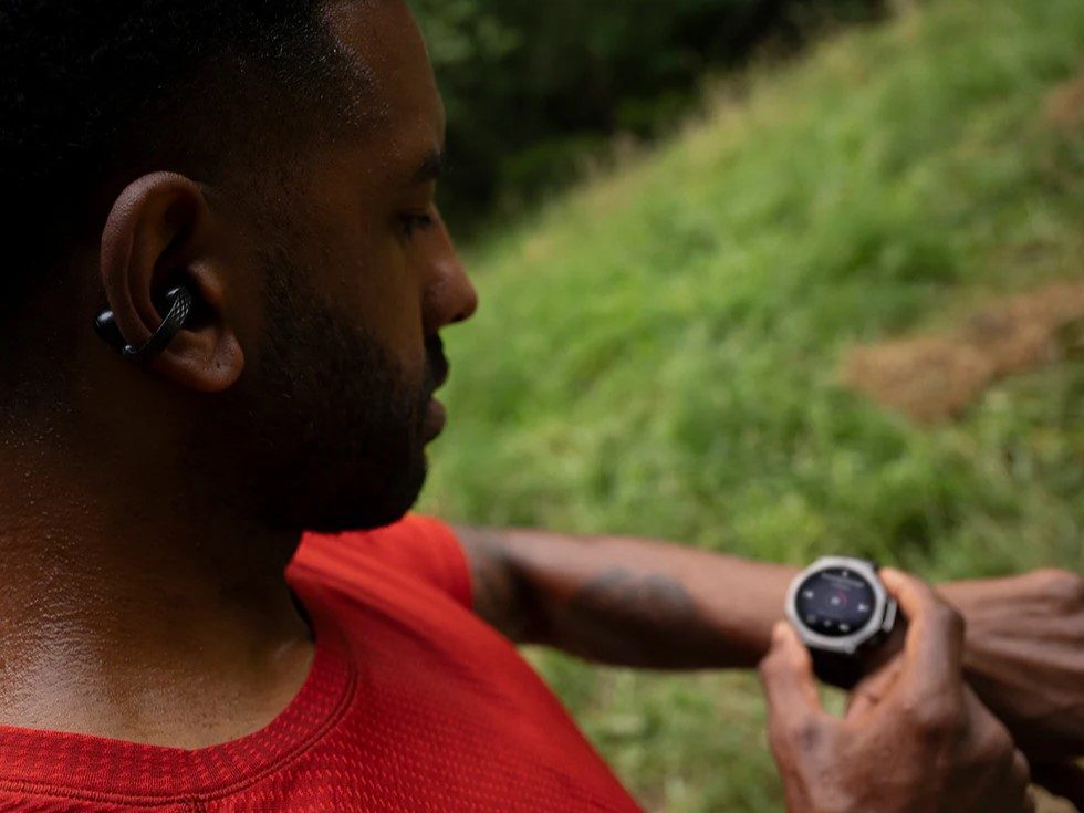 Amazfit UP open-ear earbuds worn during workout