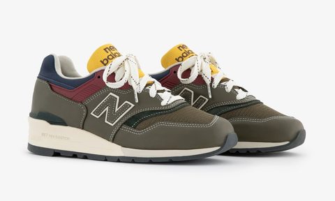 pair of new balance sneakers