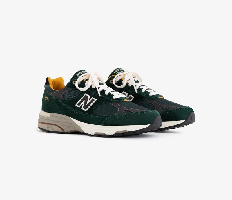 pair of green new balance sneakers