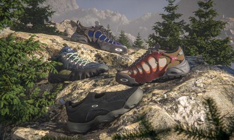 four sneakers sitting on top of rocks