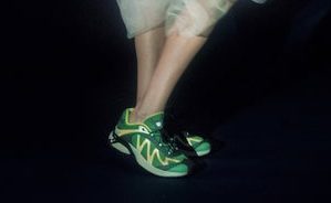 model wearing salomon sneaker