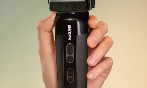 Manscaped Chairman Pro electric foil shaver in hand