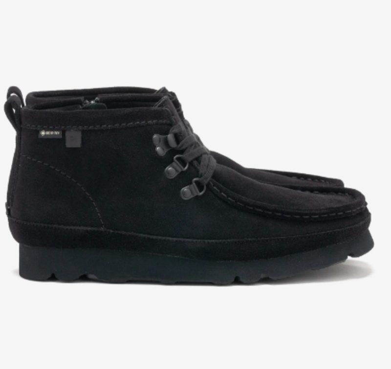 side profile of suede black clark's boots