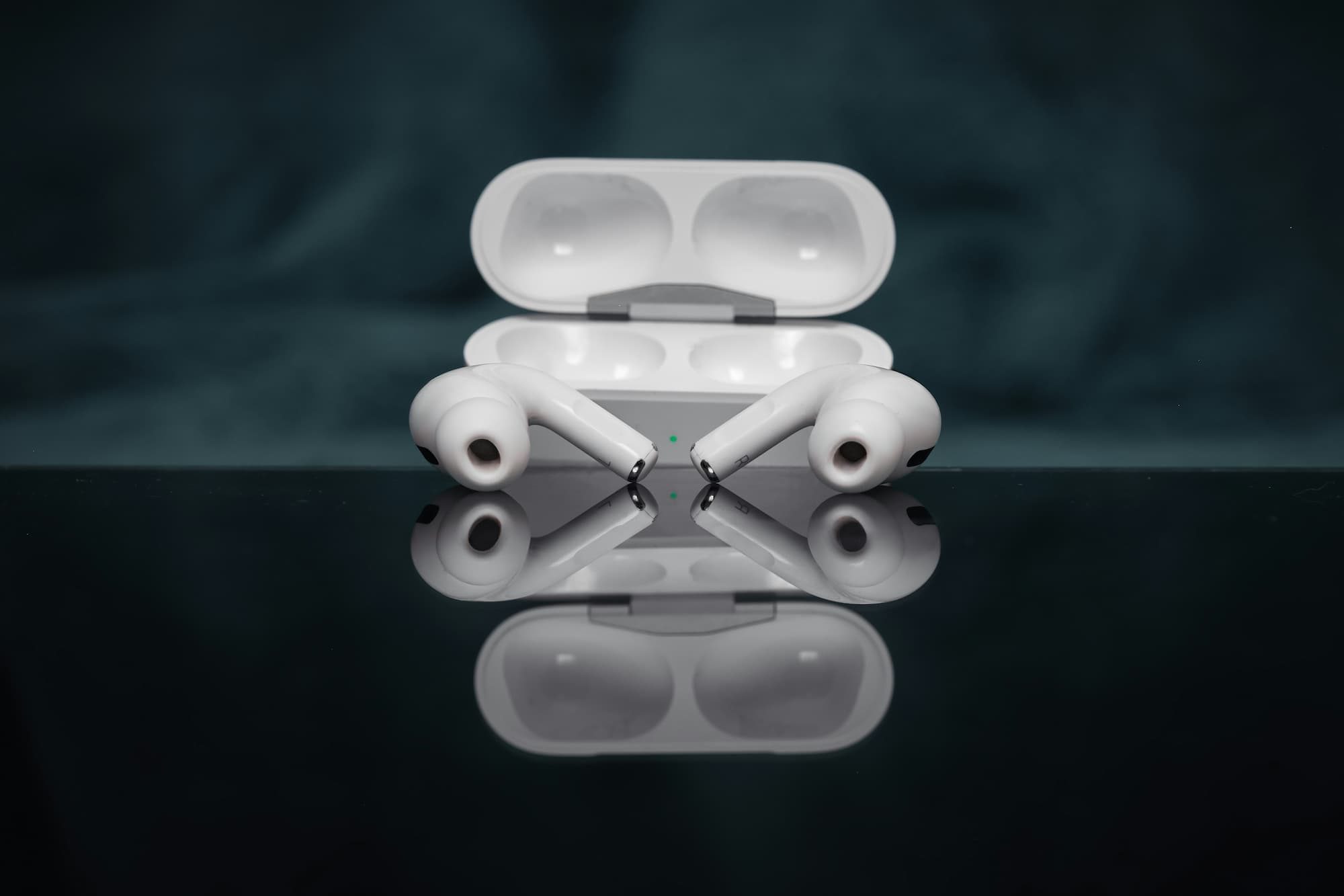 airpods pro sitting outside of their case