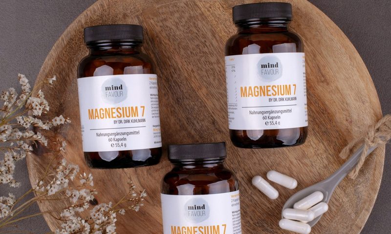 magnesium supplements in bottle electrolyte mineral on wooden round board on table pill vitamin