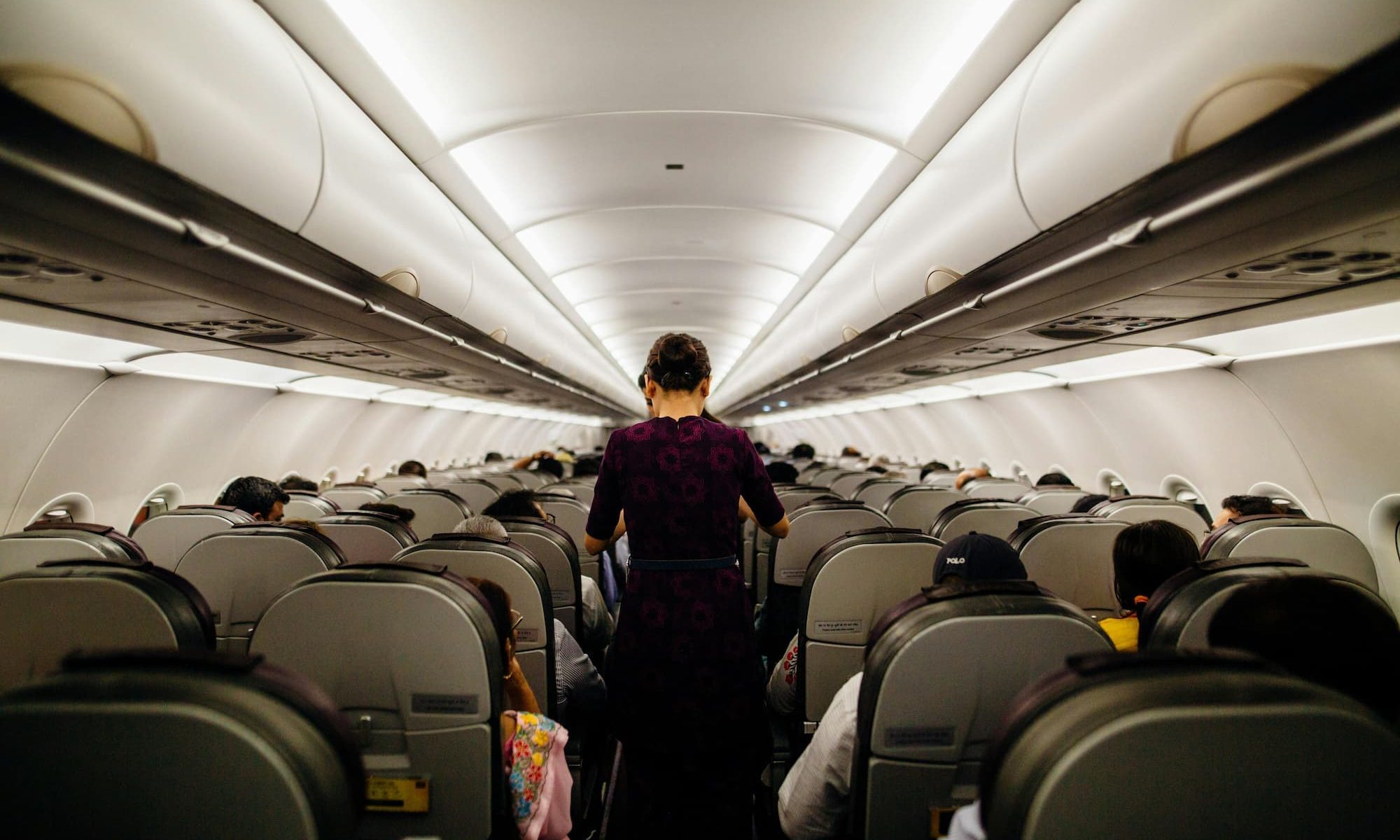 Person standing on an airplane