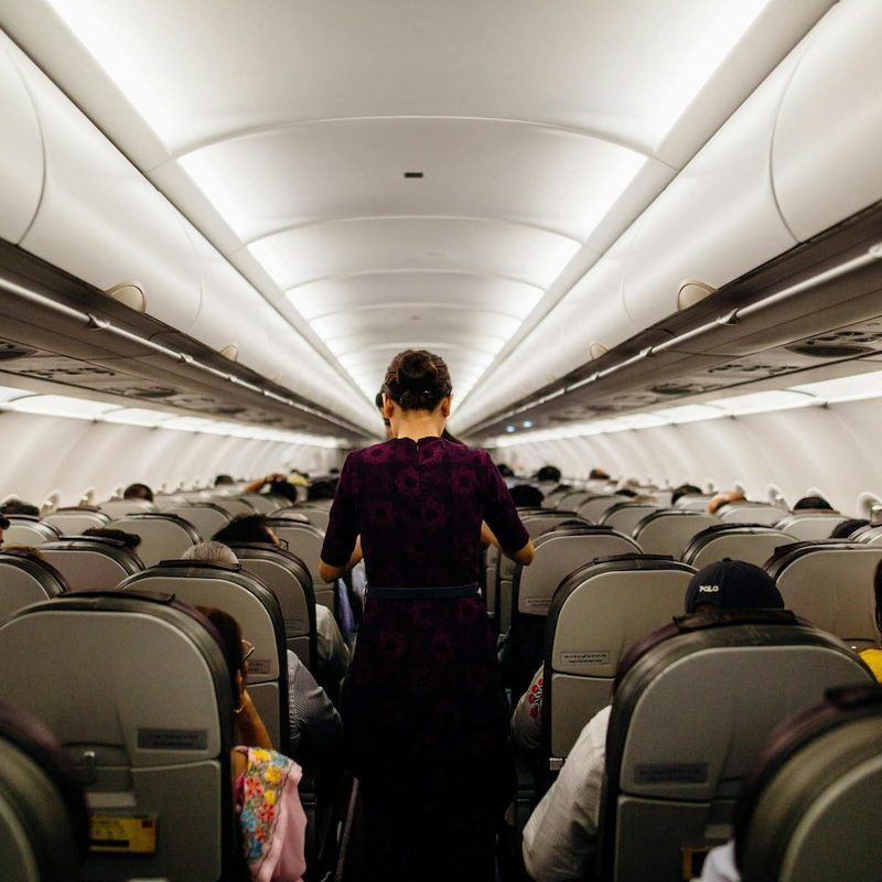Person standing on an airplane